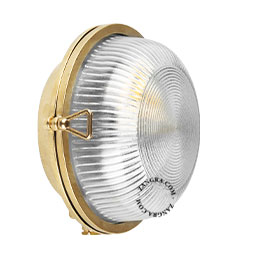Round brass bulkhead wall light.