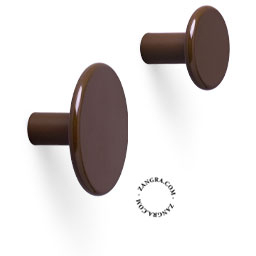 Round brown wall hook or drawer knob.