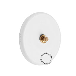 Round white porcelain light switch.