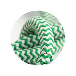 White and green zigzag fabric cable.