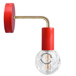 Red wall light with brass arm.
