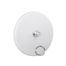 Matte white porcelain switch with nickel-plated pushbutton.