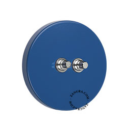 Blue round metalic pushbutton switch.