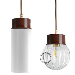 Brown pendant light with glass shade.