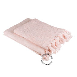 Pink fringe towel.
