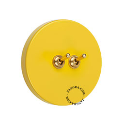 double interrupteur jaune rond et encastrable avec leviers en laiton