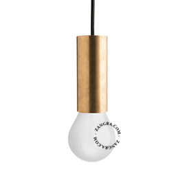 Brass pendant light with exposed light bulb.