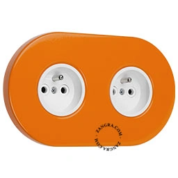Produkt doppelte orangefarbene Steckdose Foto