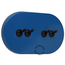 Blue light switch with 4 black levers.