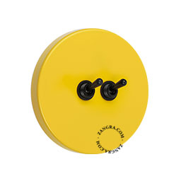double interrupteur jaune rond et encastrable avec leviers noirs