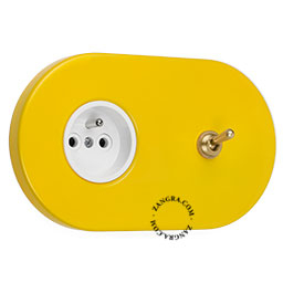 yellow flush mount outlet & two-way or simple switch – raw brass toggle