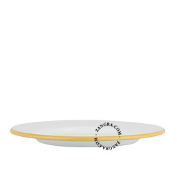 White enamel plate with caramel yellow rim.