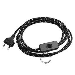 Black and white dots textile cable with plug and switch.