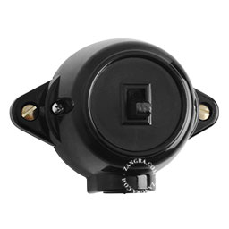 Surface-mount black toggle switch.
