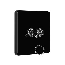 Black porcelain square-shaped switch.