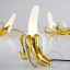 gold-coloured-banana-table-light-art-LED-resin-glass-frosted