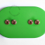 Ovale green light switch with 4 toggles.
