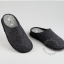 black handmade felt slippers in natural wool