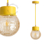 Yellow pendant light with glass shade.