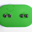 Ovale large green switch with 2 toggles and 2 pushbuttons.