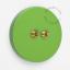 Round green & brass double pushbutton.