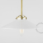 Pendant light with opal glass shade and brass arm.