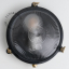 Black brass marine wall light for outdoor use or bathroom.