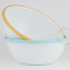 White enamel bowl with caramel yellow rim.