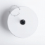 White round light switch with black toggle