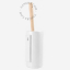 Porte-brosse de toilette en porcelaine blanche.