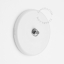 Round white porcelain light switch.