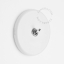 Round white porcelain light switch.