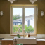 White bulkhead light for bathroom or outdoor use.