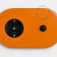 tomada e interruptor embutidos em laranja - botão de pressão preto