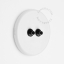 Round white porcelain light switch.