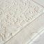 Ivory bath cotton mat.