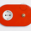 interrupteur et prise rouge avec bouton-poussoir en laiton brut