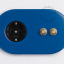2 gold push buttons on blue integrated outlet