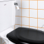 Soft-close black toilet seat.