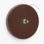 Round brown pushbutton switch.