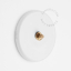 Round white porcelain light switch.