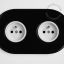 Black porcelain double outlet.