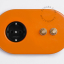 presa e interruttore arancione ad incasso - doppio pulsante in ottone grezzo