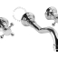 Concealed washbasin tap with two cross handles.