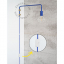 Blue wall lamp with swing arm.