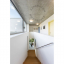 Lampe circulaire en verre pour salle de bain.