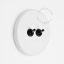 Round white porcelain light switch.