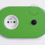 interrupteur bouton-poussoir et prise de courant encastrable verte et noir