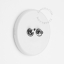 Round white porcelain light switch.