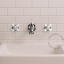 Retro wall-mounted mixer tap.